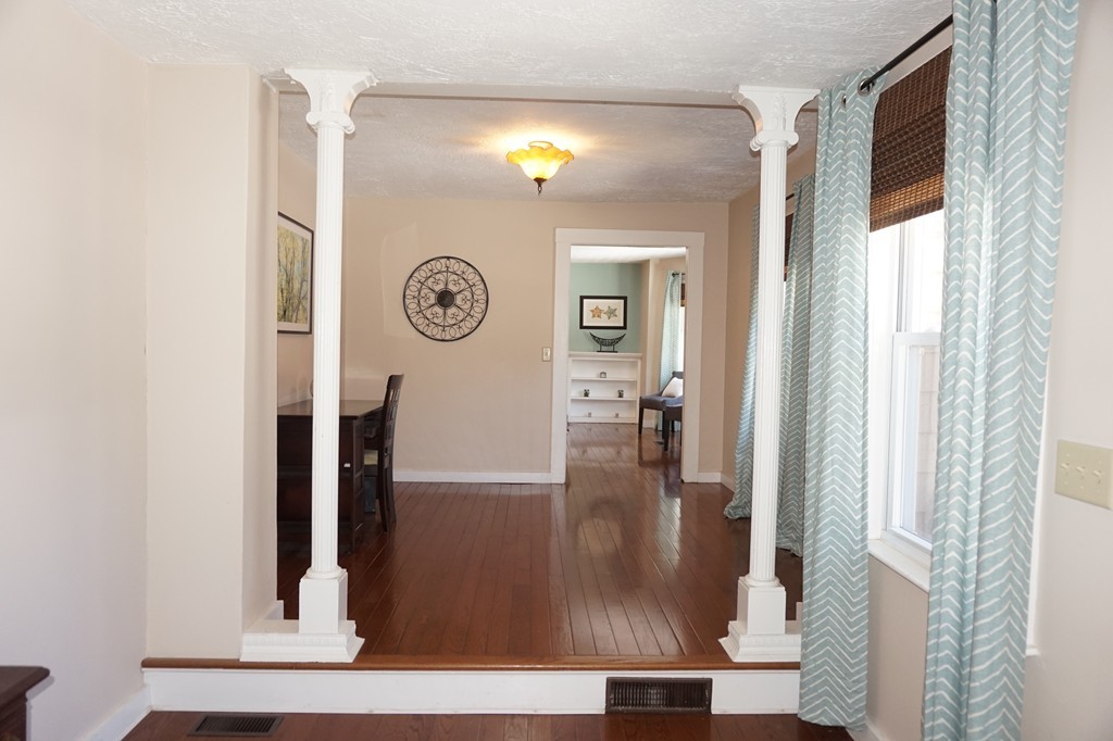 329 Mill Street Lancaster, MA 01523 - Photo 14 of 30 a view of entryway with furniture and wooden floor