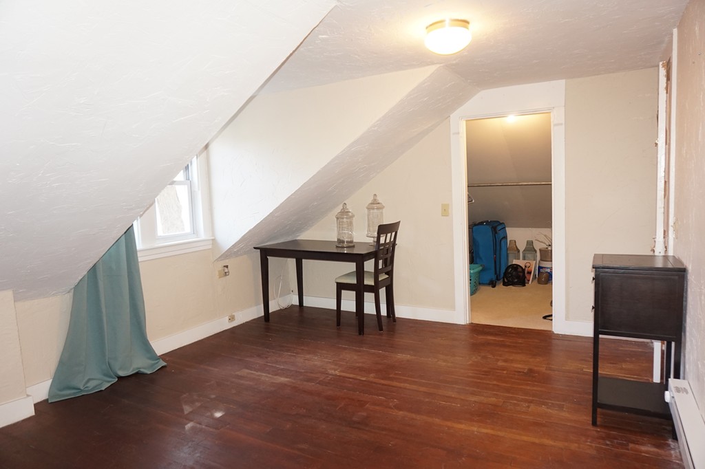 329 Mill Street Lancaster, MA 01523 - Photo 24 of 30 a view of livingroom with furniture and wooden floor