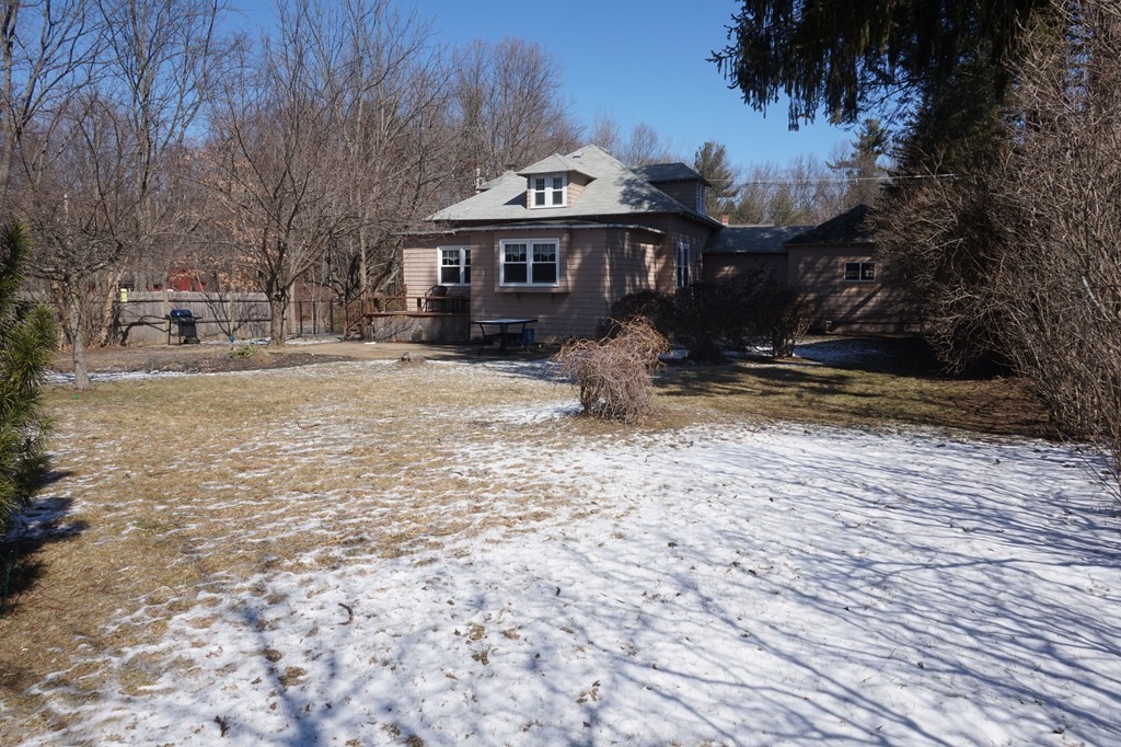 329 Mill Street Lancaster, MA 01523 - Photo 29 of 30 a front view of a house with a yard