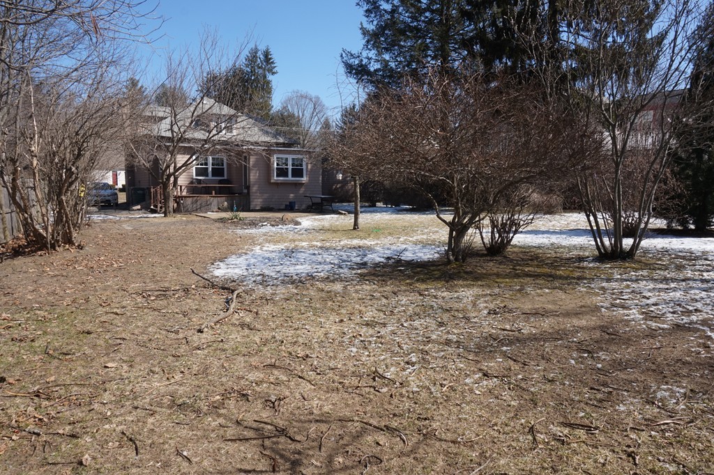 329 Mill Street Lancaster, MA 01523 - Photo 30 of 30 a view of a house with a yard