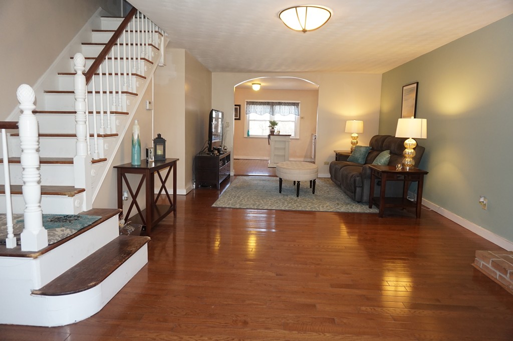 329 Mill Street Lancaster, MA 01523 - Photo 5 of 30 a view of a living room and dining room