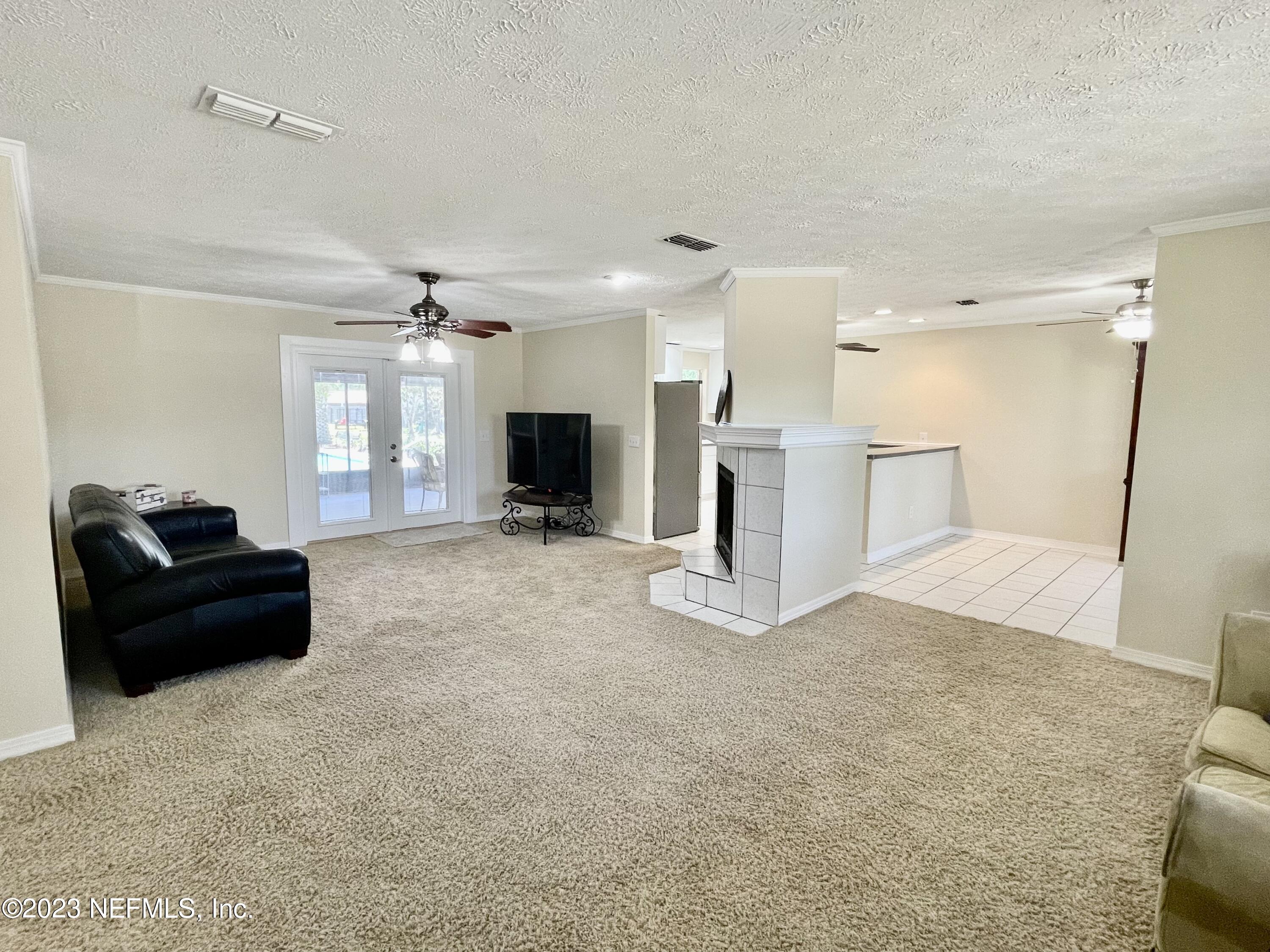 8250 Collins Road Jacksonville, FL 32244 - Photo 17 of 43 Living / Family Towards Kitchen