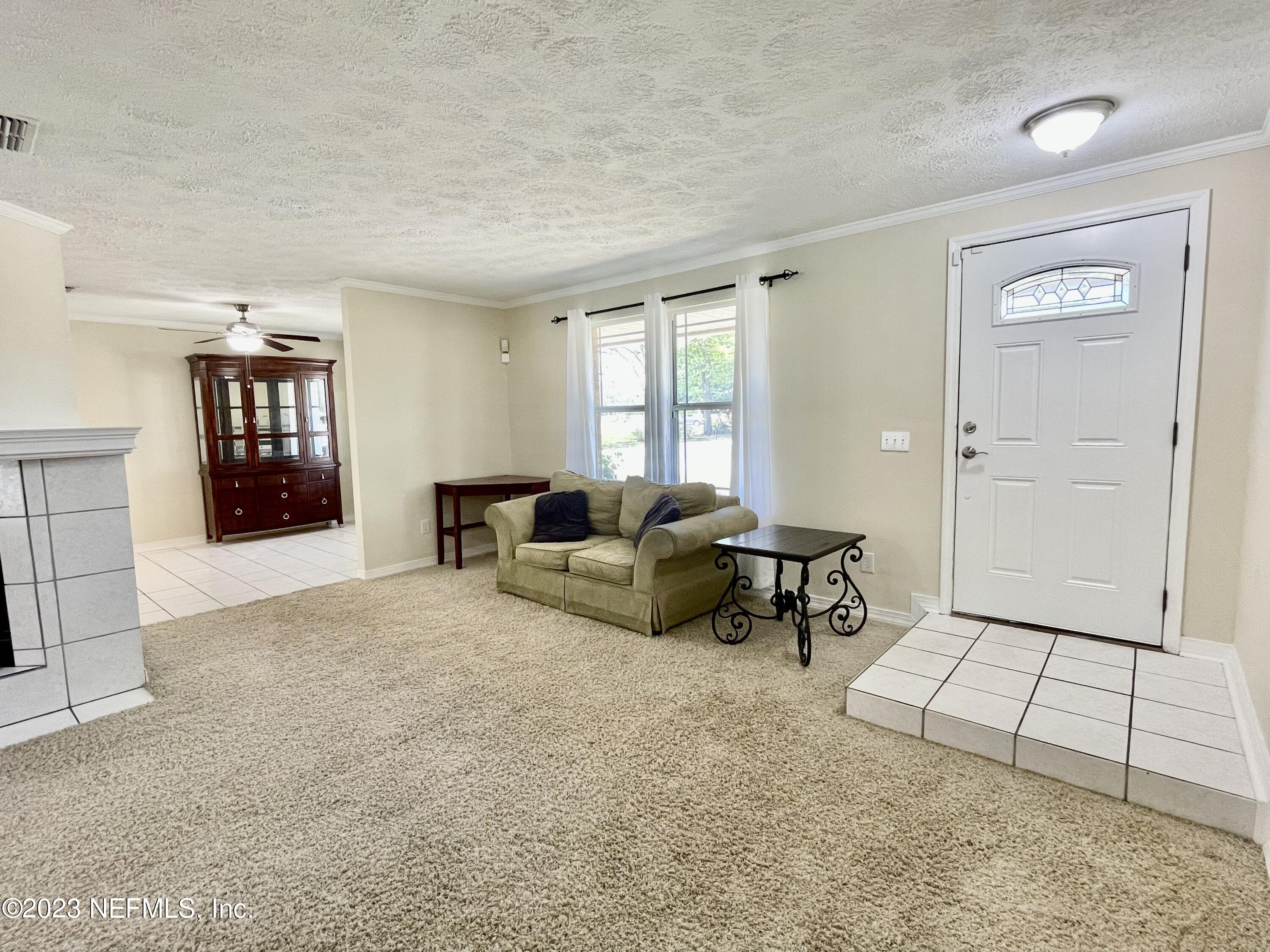 8250 Collins Road Jacksonville, FL 32244 - Photo 18 of 43 Living / Family towards dining