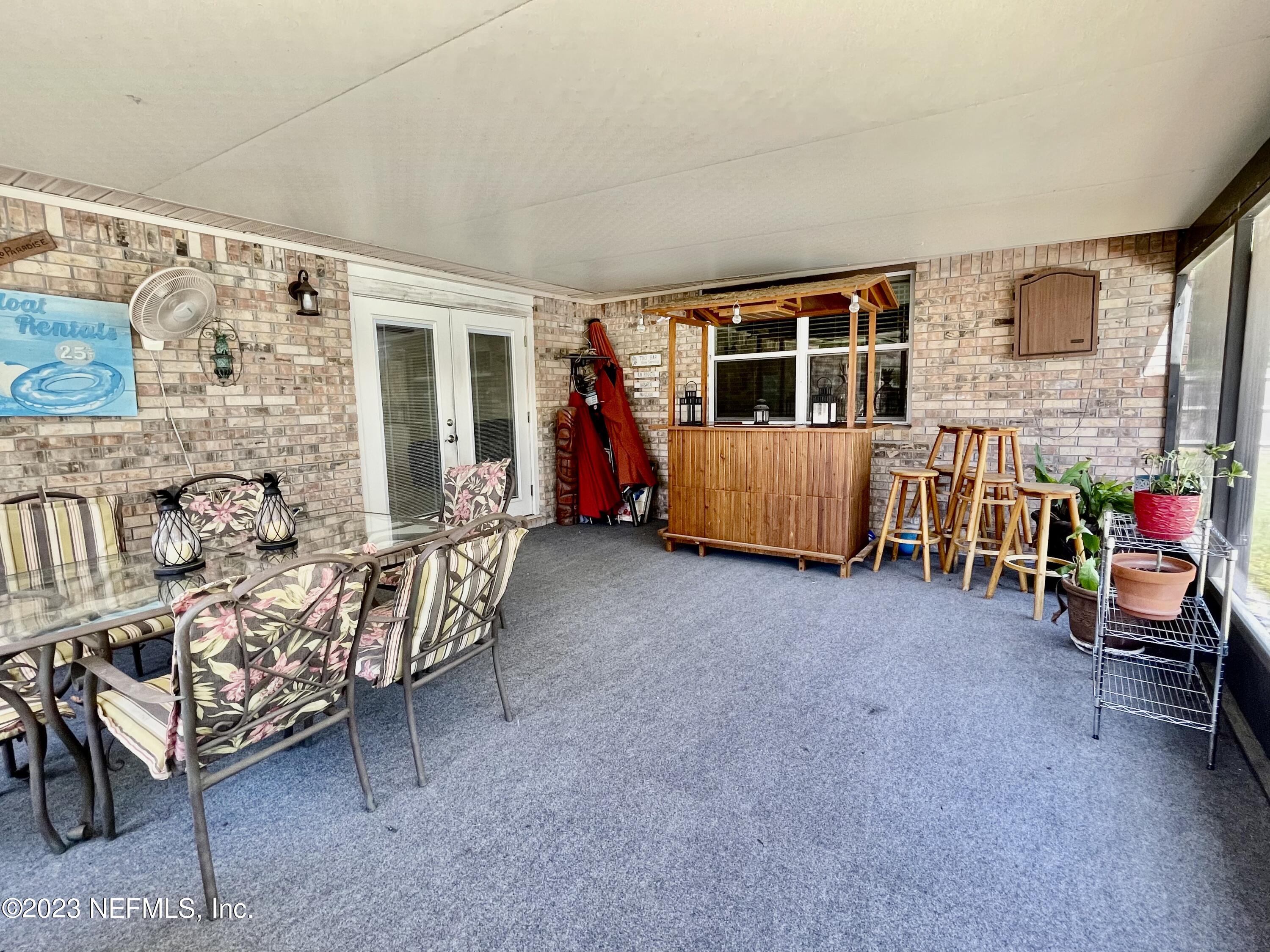 8250 Collins Road Jacksonville, FL 32244 - Photo 26 of 43 Screen Porch