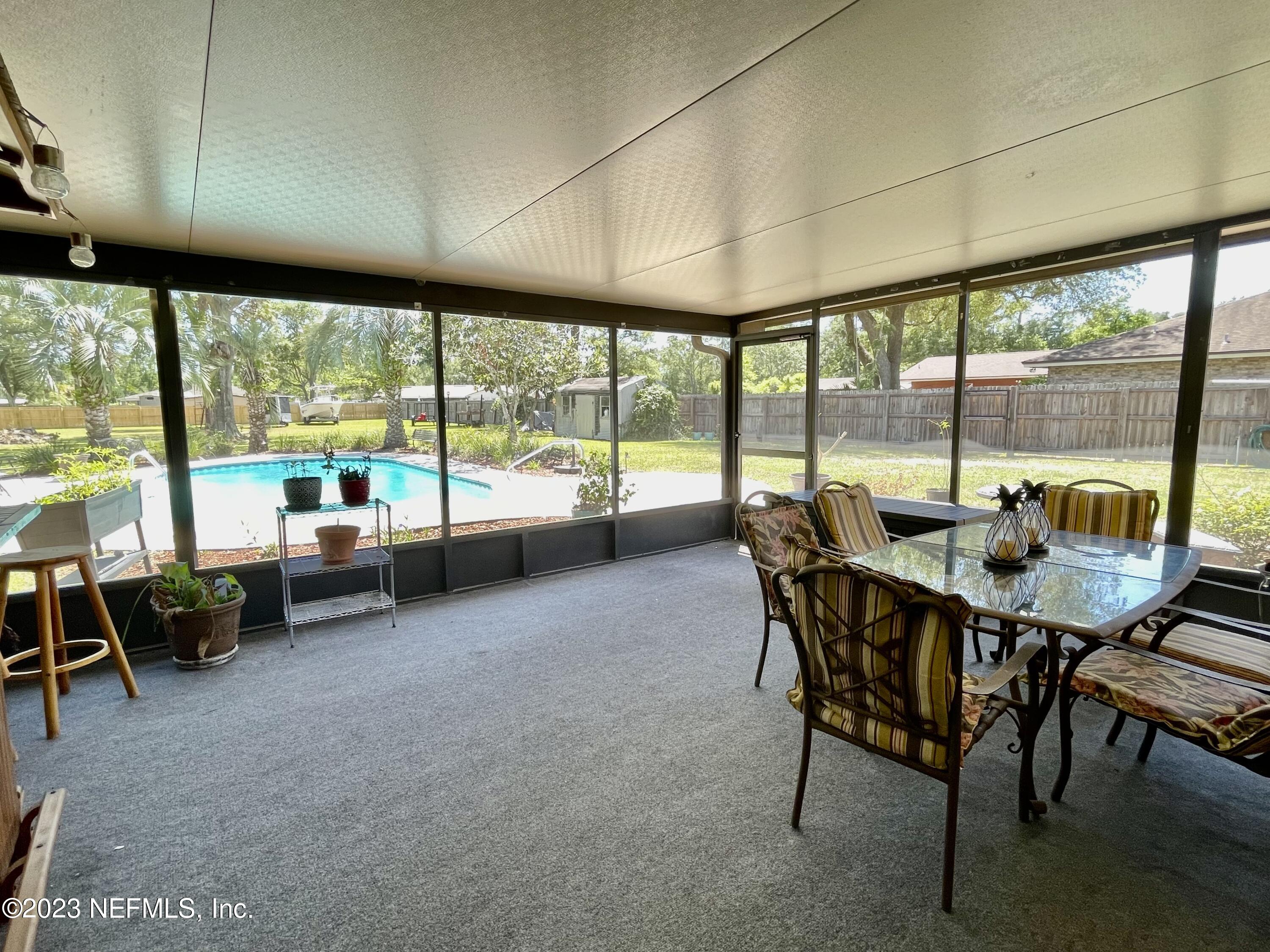 8250 Collins Road Jacksonville, FL 32244 - Photo 27 of 43 Screen Porch