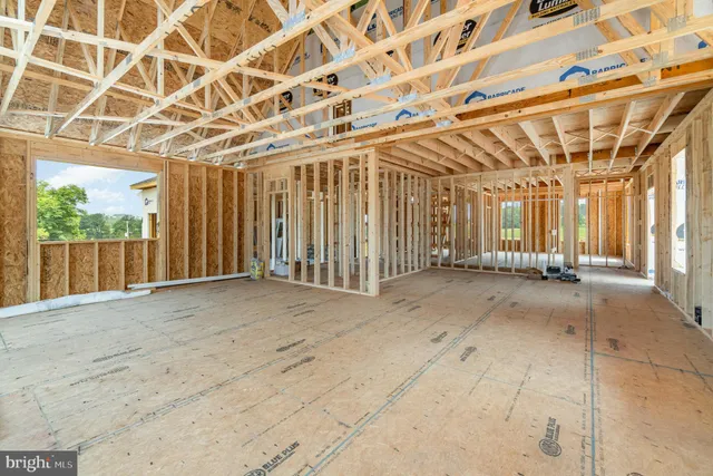 a view of a room with wooden walls