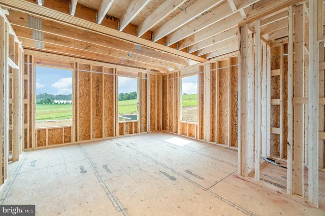 a view of a room with wooden walls