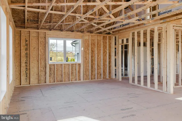 a view of a room with wooden walls