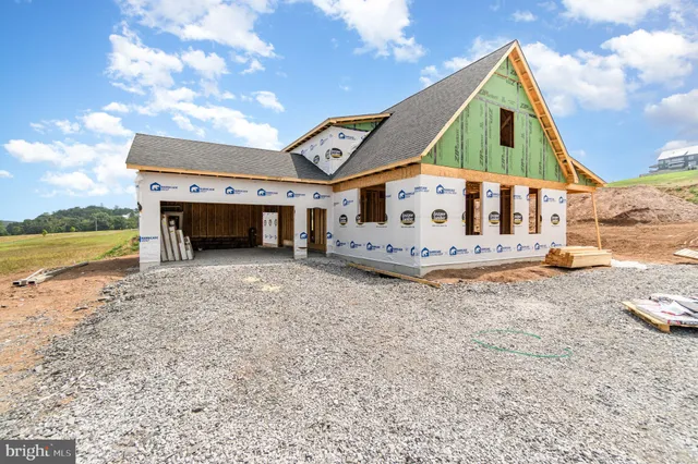 a spacious bathroom with a sink and a yard