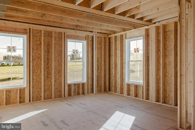 a view of entryway with a front door