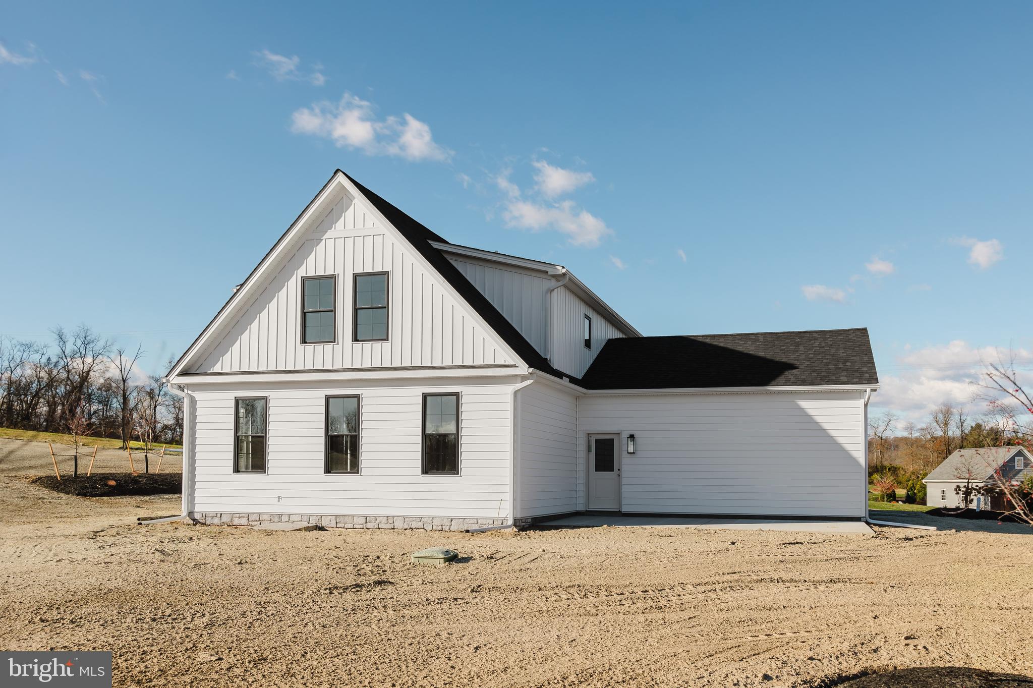 5 Mowery Road Dillsburg, PA 17019 - Photo 8 of 8 a front view of a house with a wooden fence