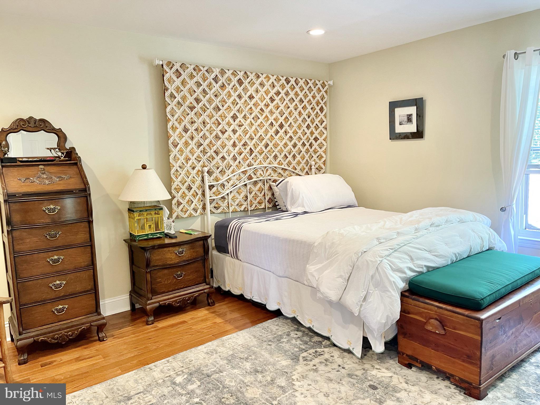 302 Marten Road Princeton, NJ 08540 - Photo 14 of 22 a bedroom with a bed and dresser