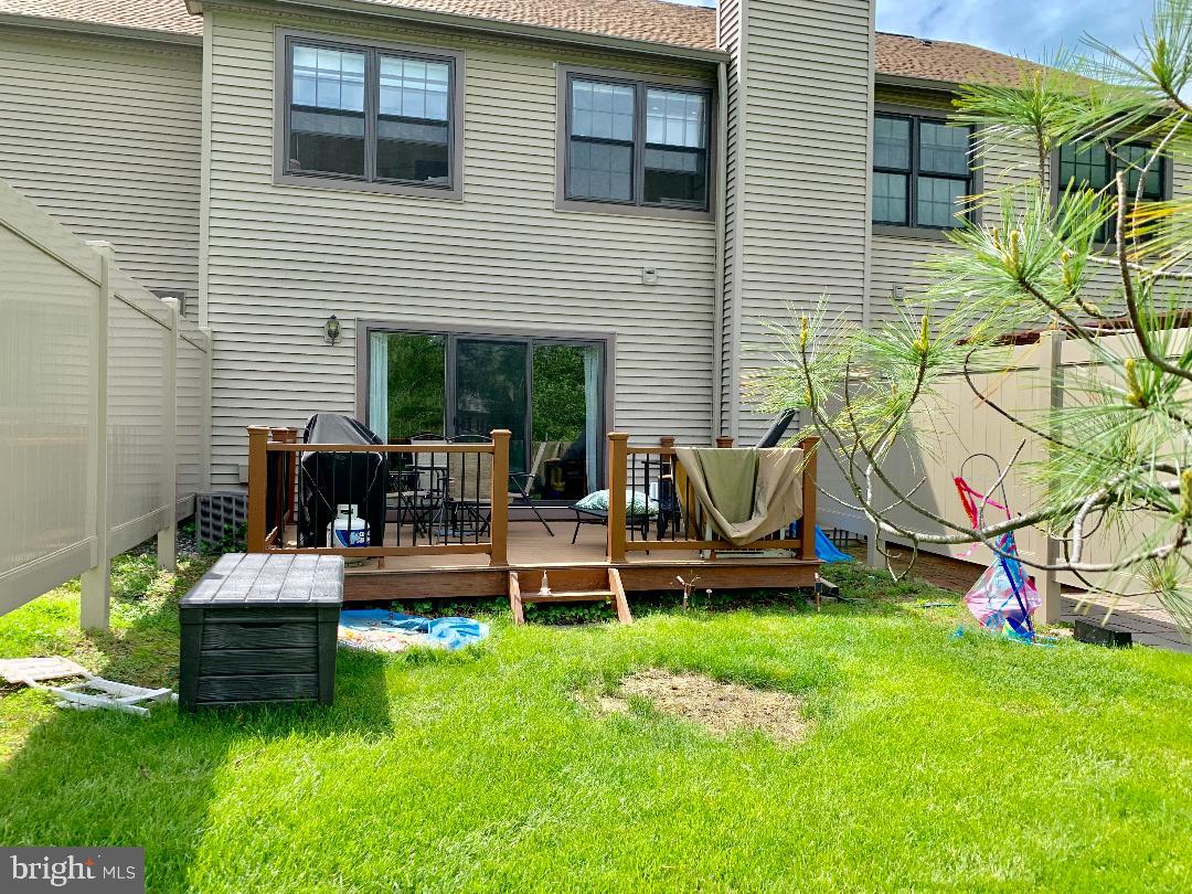 302 Marten Road Princeton, NJ 08540 - Photo 19 of 22 a view of a house with backyard sitting area and garden