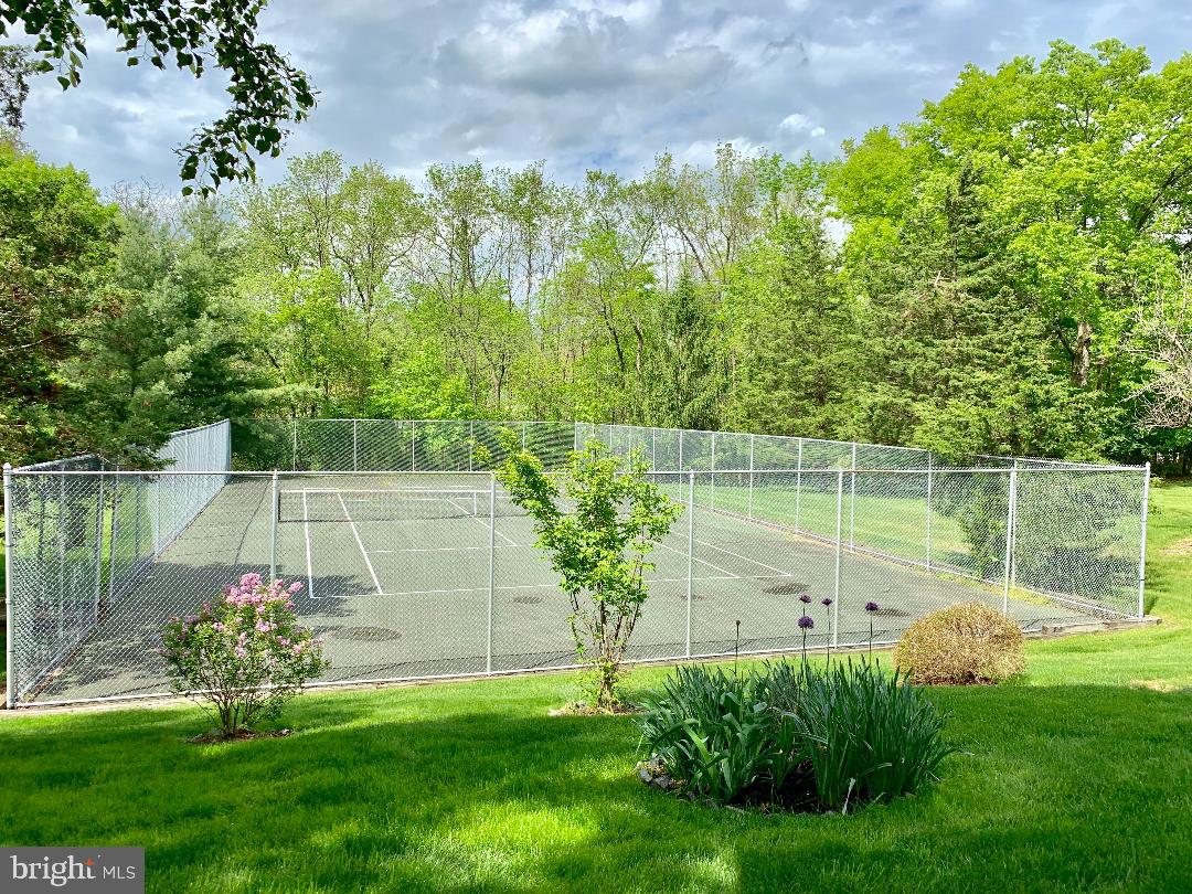302 Marten Road Princeton, NJ 08540 - Photo 21 of 22 a view of a garden with a lake