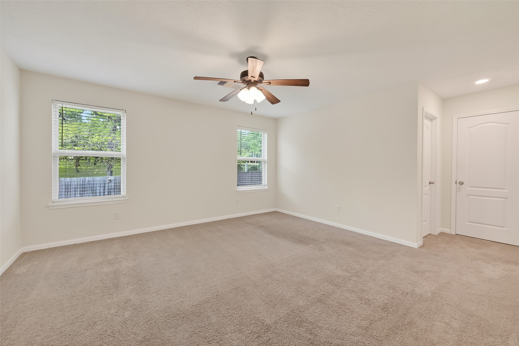 2107 Parnevik Place Conroe, TX 77304 - Photo 22 of 44 The Primary Bedroom