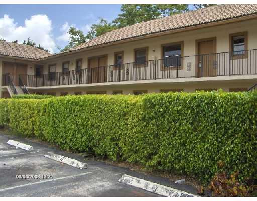 11216 West Sample Road, Unit 9B Coral Springs, FL 33065 - Photo 1 of 14 Exterior Front