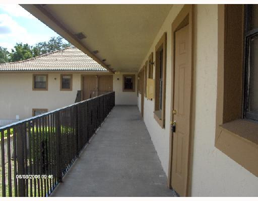 11216 West Sample Road, Unit 9B Coral Springs, FL 33065 - Photo 2 of 14 Exterior Front