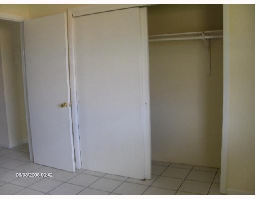 11216 West Sample Road, Unit 9B Coral Springs, FL 33065 - Photo 9 of 14 Master Bedroom