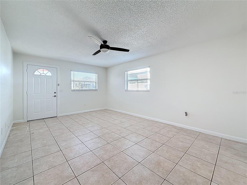 650 Athens Street Dunedin, FL 34698 - Photo 19 of 39 a view of an empty room with a window