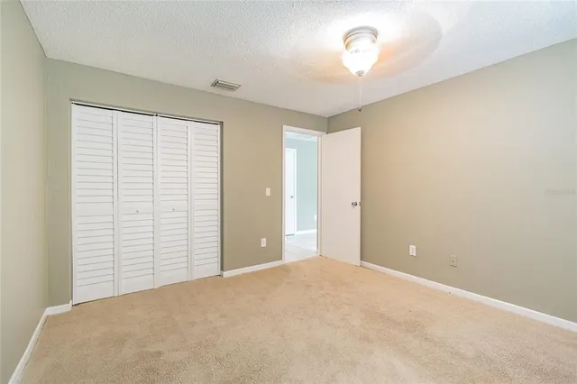 a view of a room with an empty space