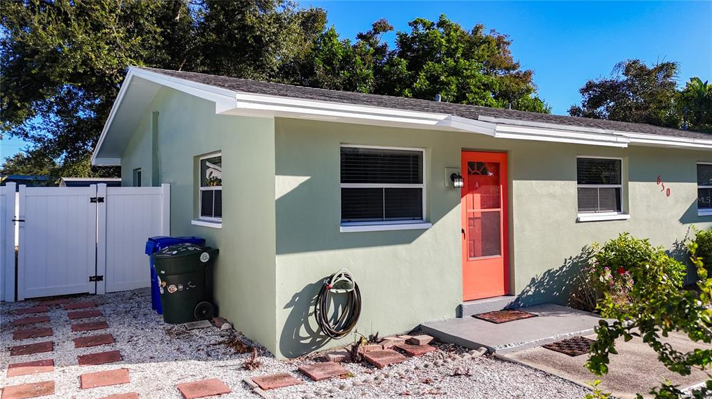 650 Athens Street Dunedin, FL 34698 - Photo 3 of 39 a view of a house with backyard