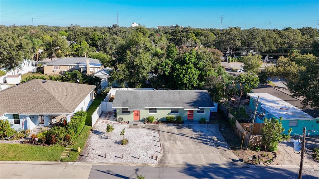 650 Athens Street Dunedin, FL 34698 - Photo 39 of 39 an aerial view of a house with yard swimming pool and outdoor seating
