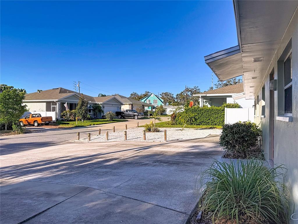 650 Athens Street Dunedin, FL 34698 - Photo 4 of 39 a view of street with trees