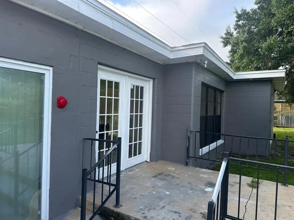 a view of a backyard of the house