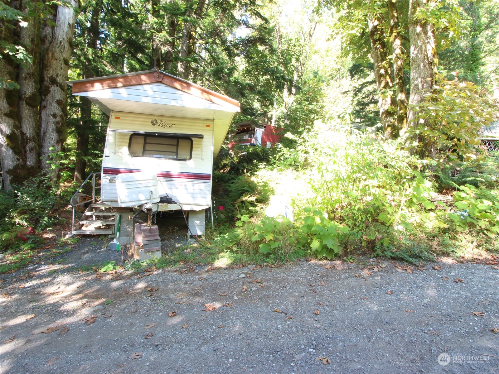 6426 Santa Fe Trail Maple Falls, WA 98266 - Photo 9 of 15 a front view of a house with garden