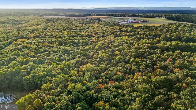a view of a large body of water with a building in the background