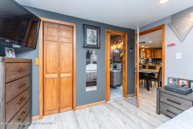 a view of a dining room kitchen with furniture and wooden floor
