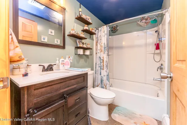 a view of a workspace with furniture and toys