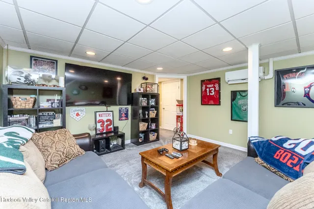 a workspace with furniture and a window