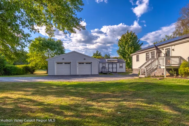 a view of a swimming pool with an ocean view
