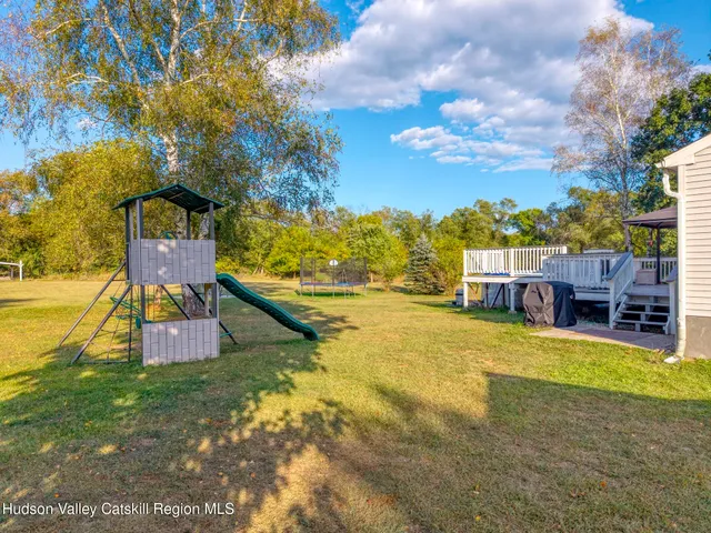 a backyard of a house with seating space
