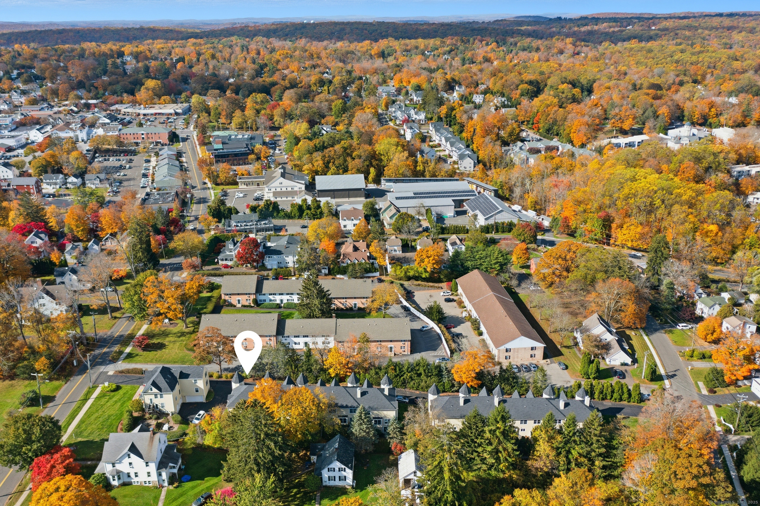 59 Prospect Street, Unit C Ridgefield, CT 06877 - Photo 33 of 38 an aerial view of residential houses with outdoor space