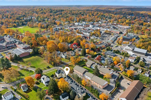 an aerial view of residential building with parking space