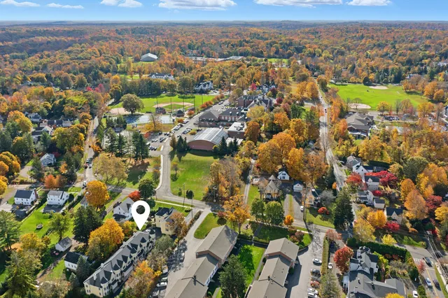an aerial view of a city with lots of residential buildings