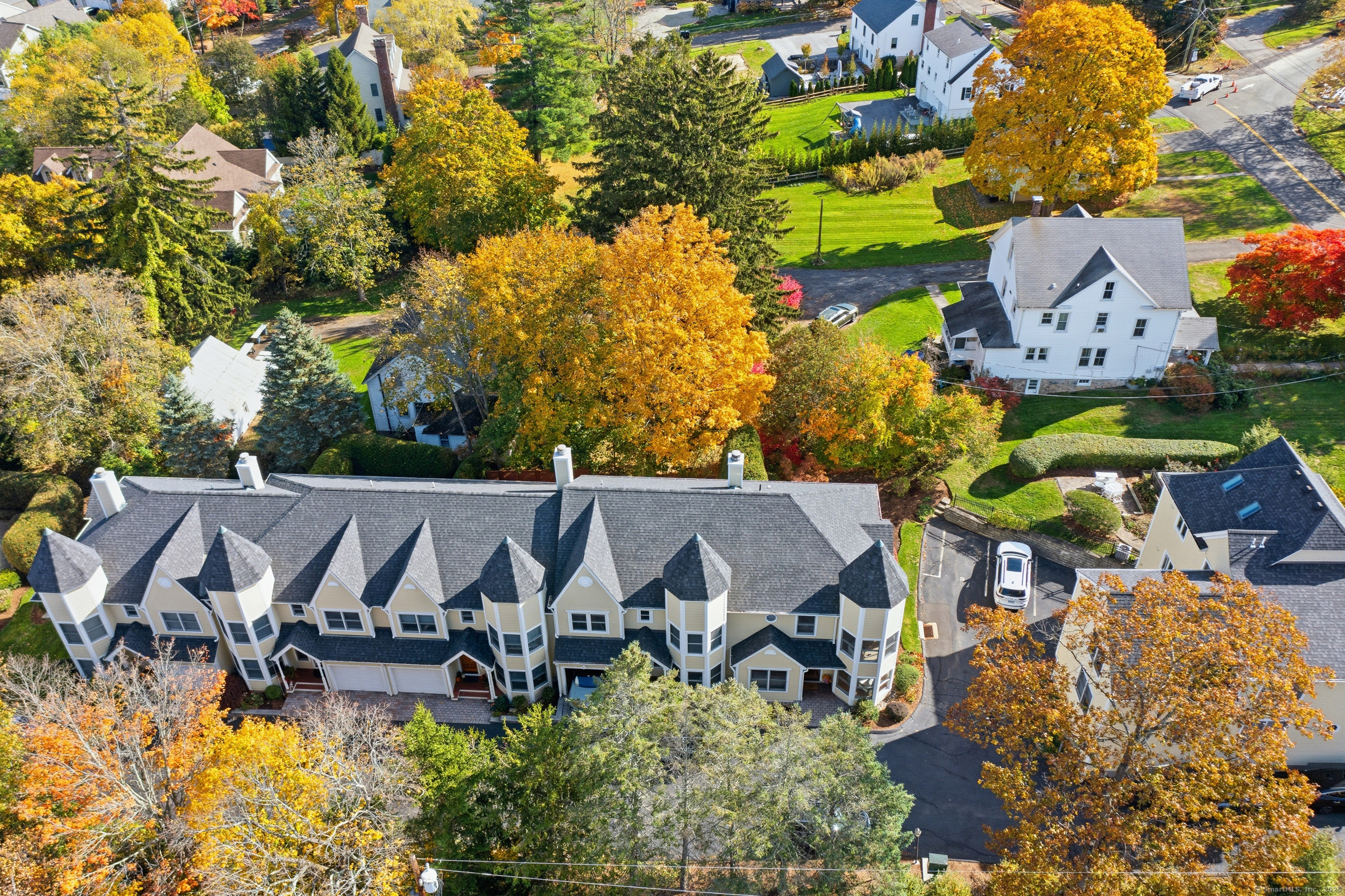 59 Prospect Street, Unit C Ridgefield, CT 06877 - Photo 37 of 38 a view of yard with swimming pool and outdoor seating
