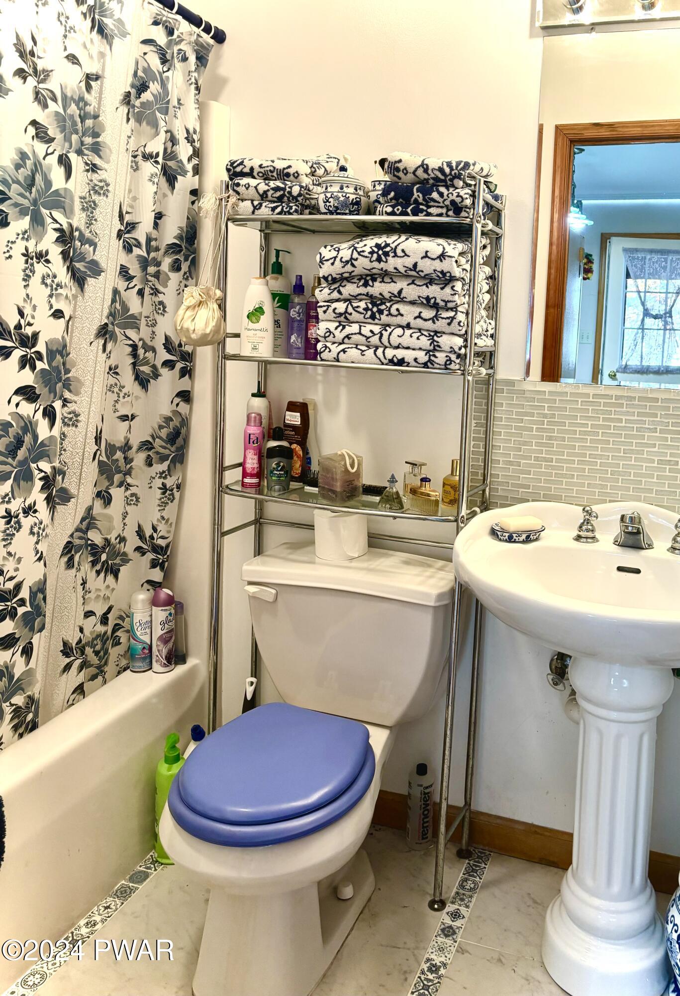 136 Stamford Road Dingmans Ferry, PA 18328 - Photo 33 of 52 a bathroom with a sink toilet and shower