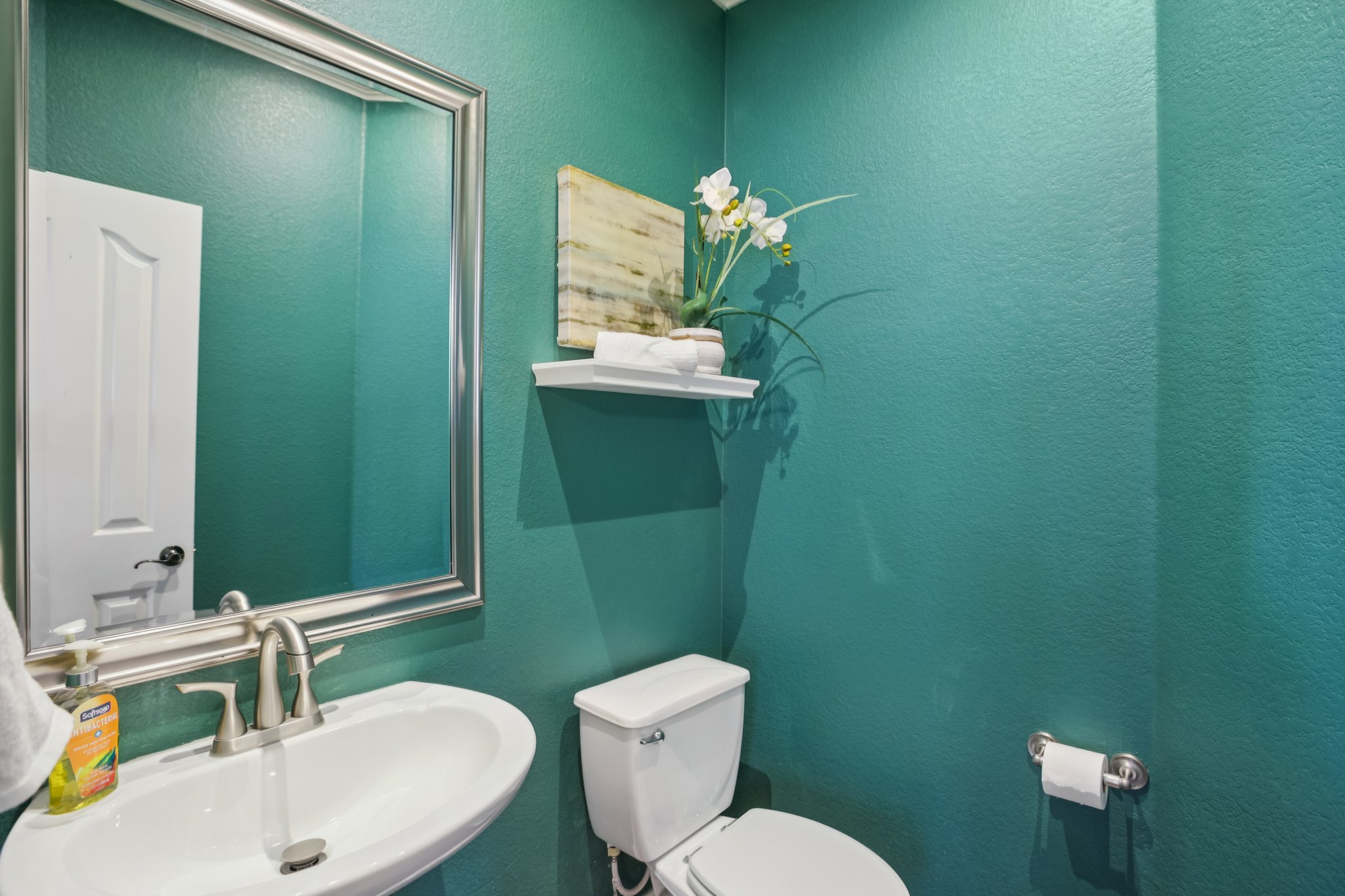 10525 Roy Butler Drive Austin, TX 78717 - Photo 20 of 40 Half bathroom on main level