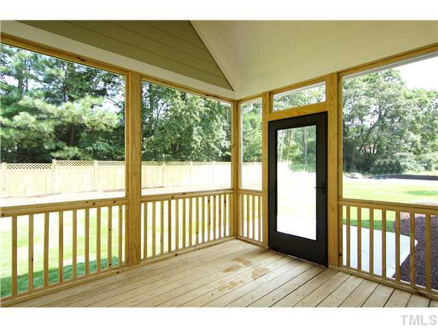 2800 Romelia Lane Raleigh, NC 27613 - Photo 22 of 22 Screened Porch has a vaulted ceiling with a fan installed. Cement grilling pad out screened door and privacy fence across back yard. Beautiful view. Screened Porch