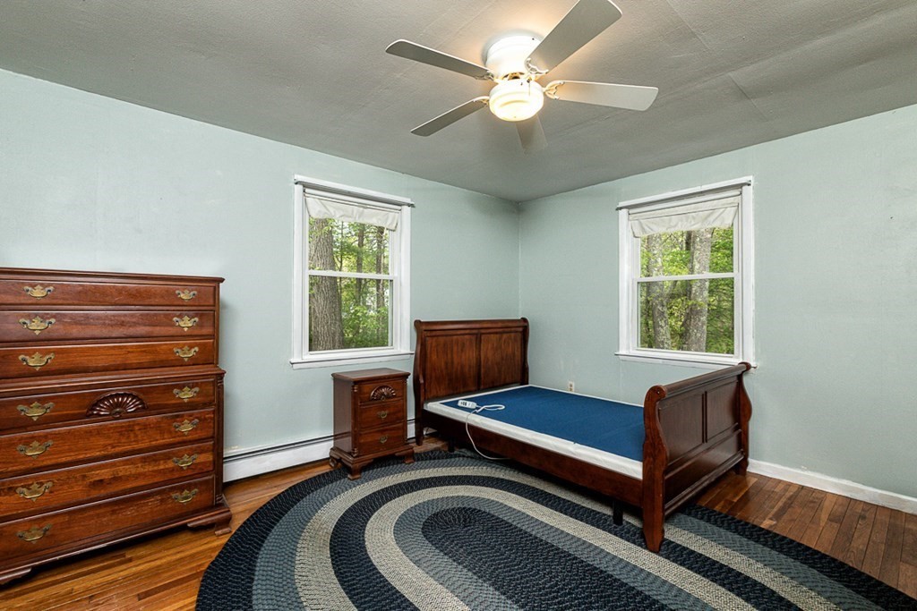 113 Newbury Road Rowley, MA 01969 - Photo 14 of 26 a living room with furniture and a window