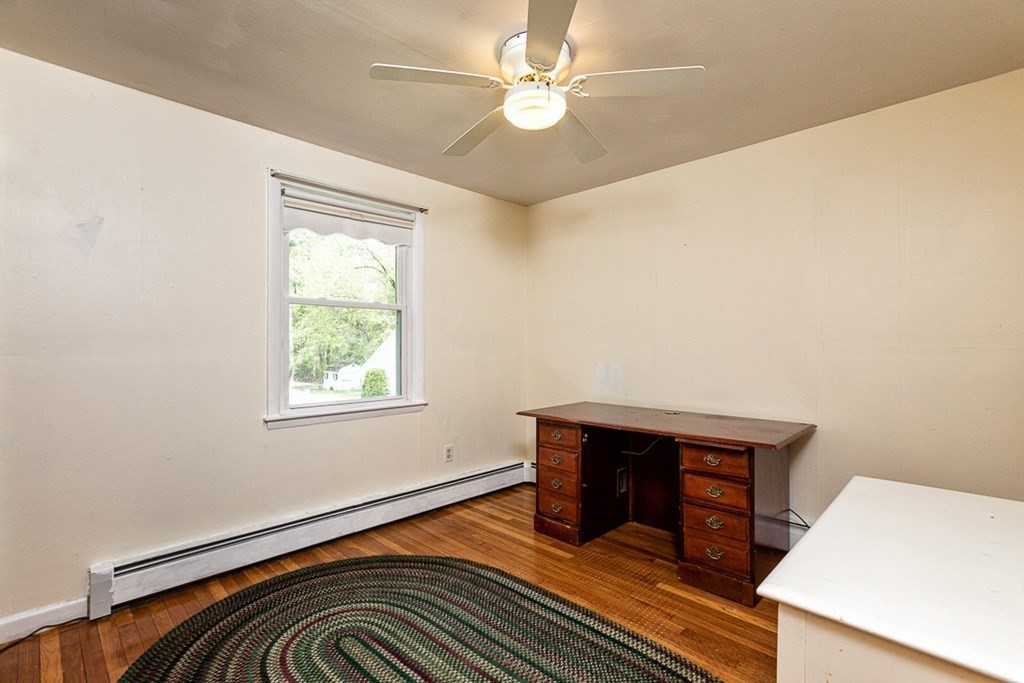 113 Newbury Road Rowley, MA 01969 - Photo 16 of 26 a view of a livingroom with a workspace