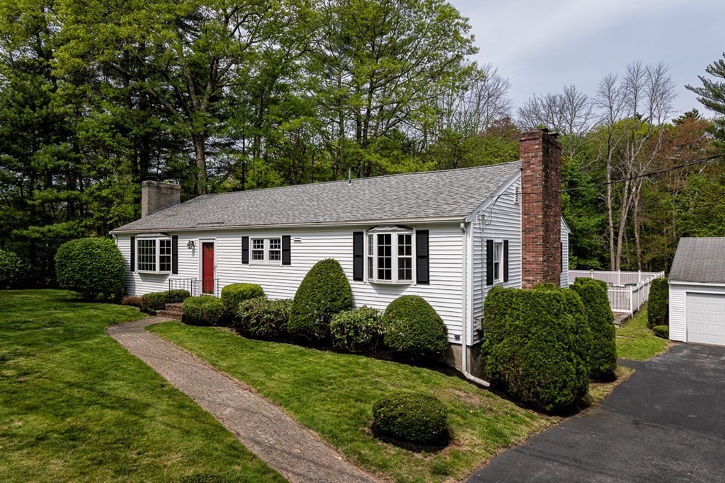 113 Newbury Road Rowley, MA 01969 - Photo 26 of 26 a view of a house with a yard and potted plants