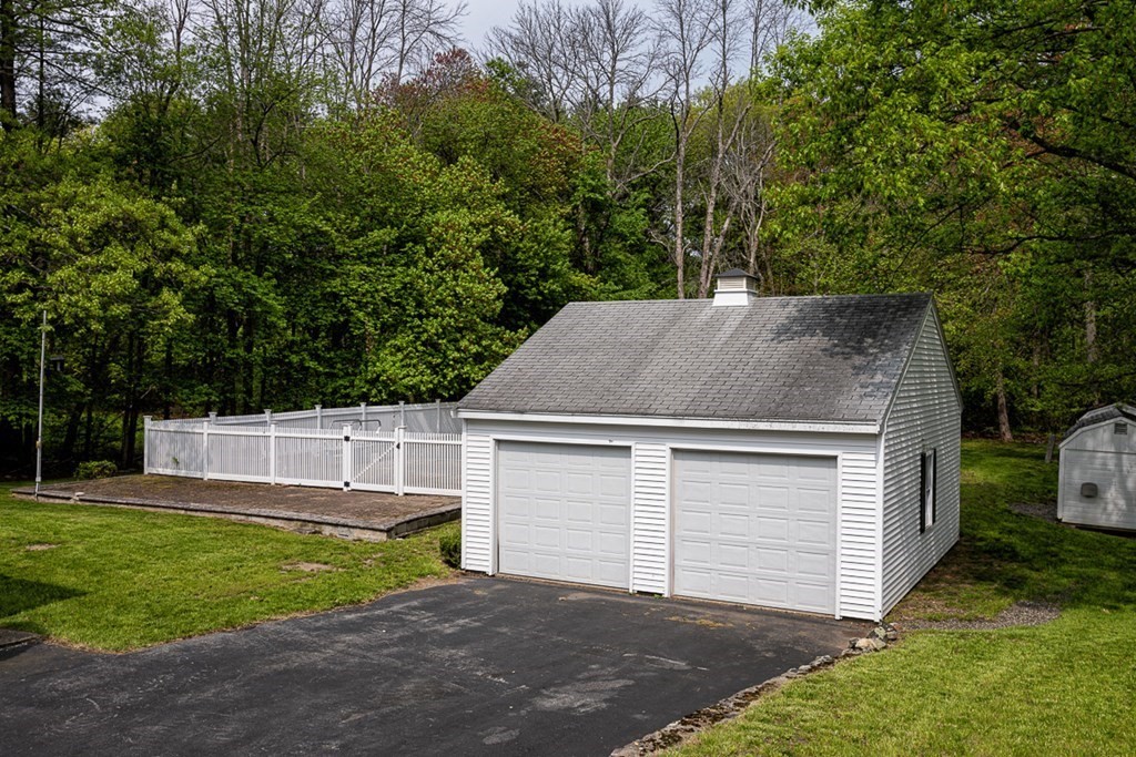 113 Newbury Road Rowley, MA 01969 - Photo 3 of 26 a view of a house with a backyard