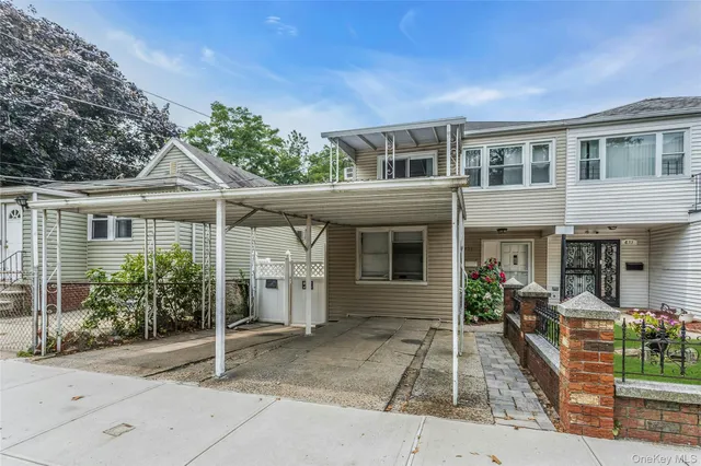 a front view of a house with a porch