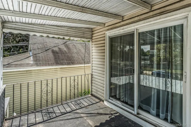 a view of a porch with a door