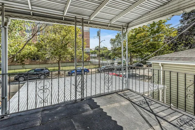 a view of a street with a large window
