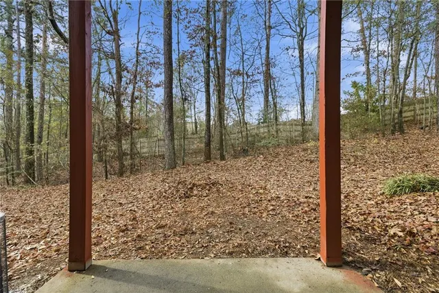a view of a house with a street